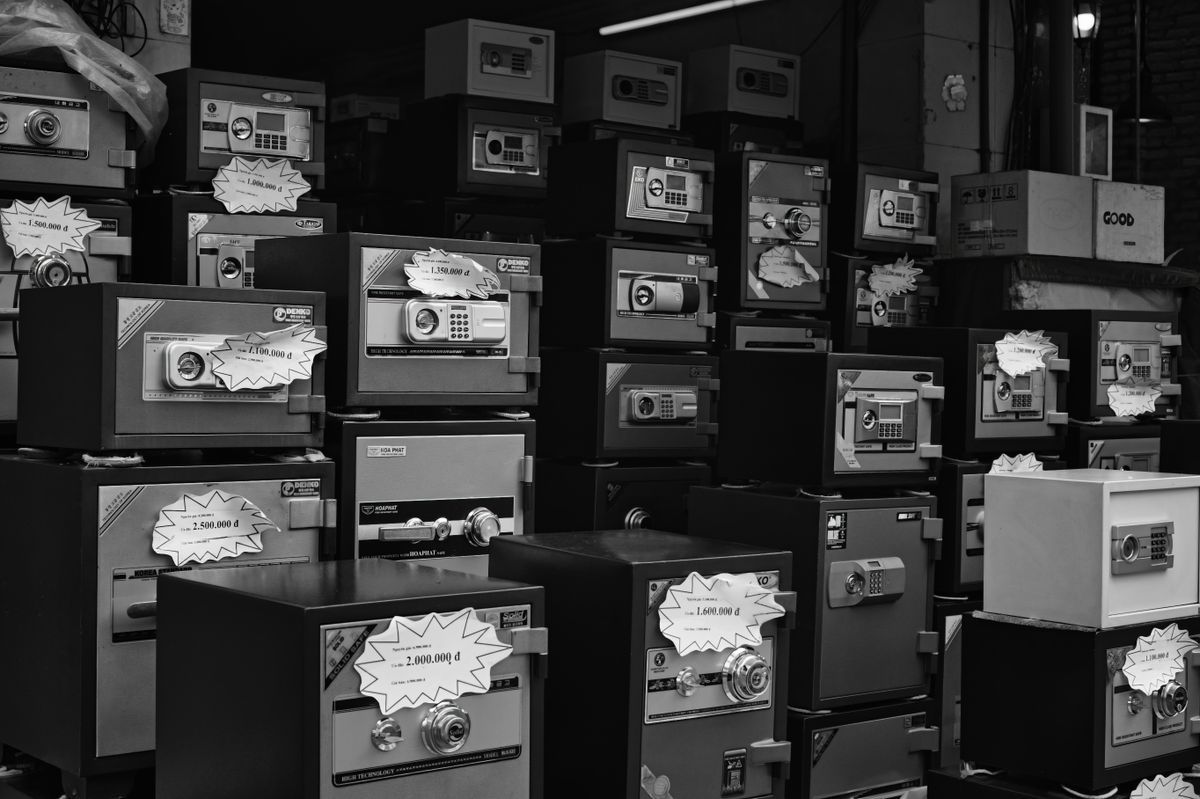 Safes of different sizes lined up, representing the range of safes Liberty Movers moves